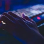 photo of person typing on computer keyboard